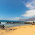 Casa Bianca Caleta De Casa de Férias *
